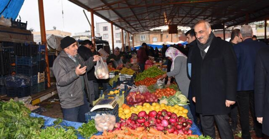 Bayık semt pazarı esnafı ile buluştu